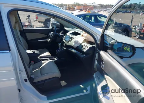 2016 Honda Cr-V Touring z USA, uszkodzony, nr VIN 5J6RM3H92GL018129